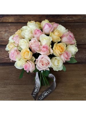 bouquet of white, peach and pink roses