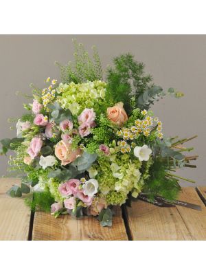 bouquet of green hydrangeas, peach roses, pink lisianthus