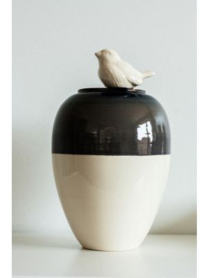 Reflection is a handmade vase half cream and half grey with a 3D bird on the rim.