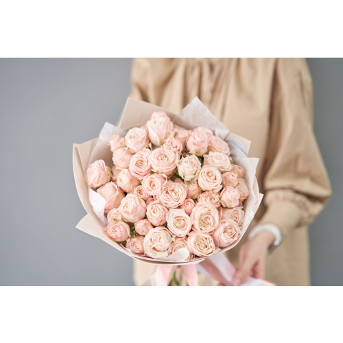 bouquet of white, peach and pink roses