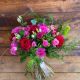 bouquets of red roses and pink gerberas