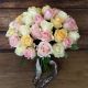 bouquet of white, peach and pink roses