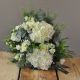 bouquet of white hydrangeas, white roses and white lisianthus 